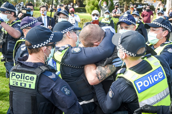 Protesters against Melbourne's lockdown rallied in September. Some used Telegram to organise their activities.