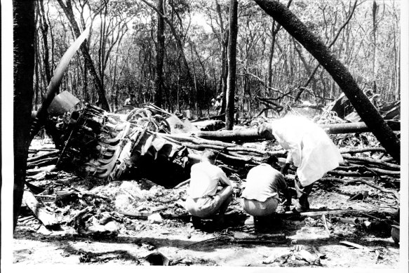 The wreckage of the downed plane, pictured several weeks after it crashed in 1961. 