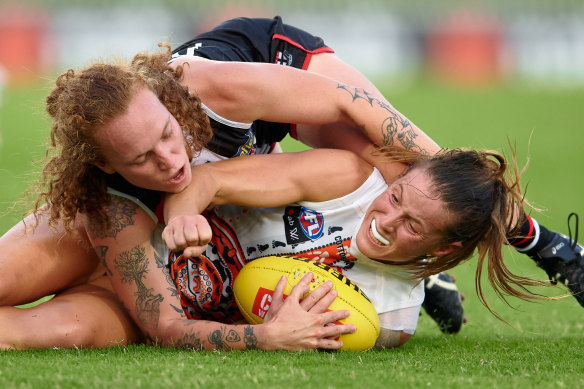 Nicola Barr is tackled by St Kilda’s Tilly Lucas-Rodd.