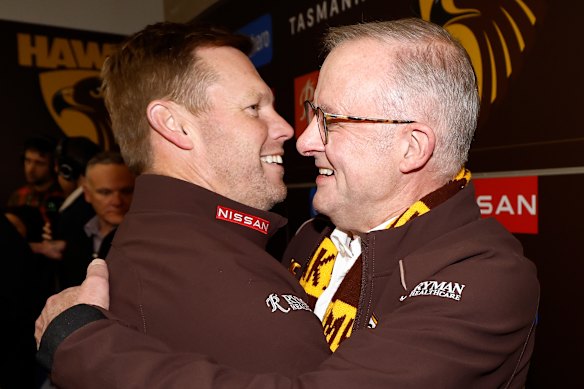 The first Australian Minister, and the Hawks Fan, Anthony congruises Sam Mitchell in the pavement chambers after 13 sells on the Bulldogs.