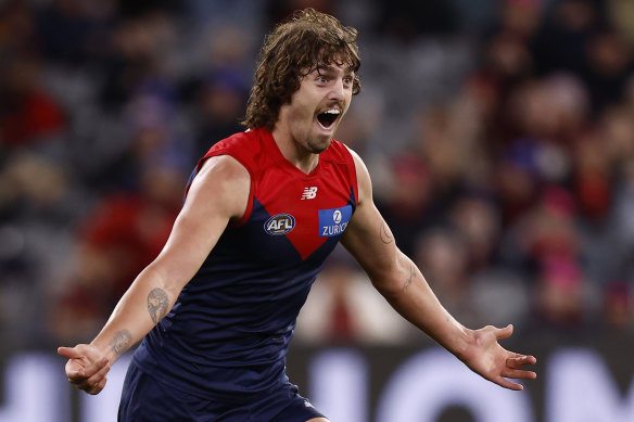 Luke Jackson celebrates a goal for the Demons.