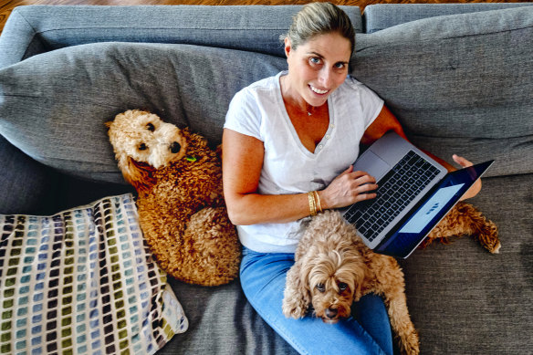 Nicole Goldhammer enjoying the company of her dogs Ruby and Goldie.