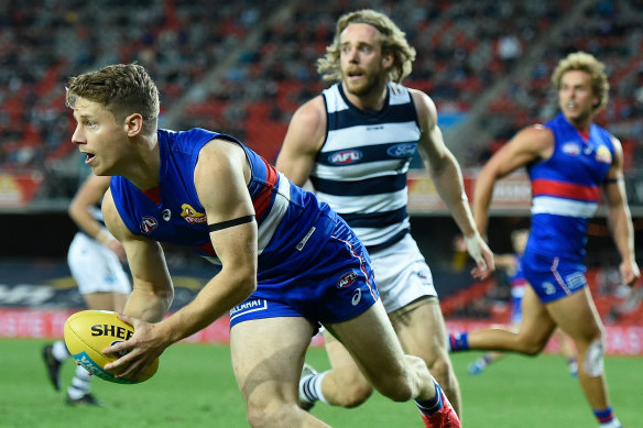 Lachie Hunter during the round 14 AFL match between the Western Bulldogs and the Geelong Cats at Metricon Stadium on August 28.