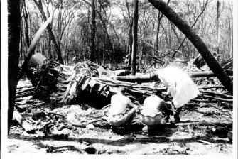 The wreckage of the downed plane, pictured several weeks after it crashed in 1961. 