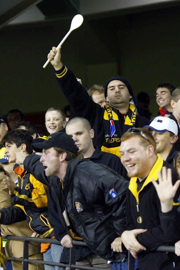 Richmond fans wave a wooden spoon in 2004.