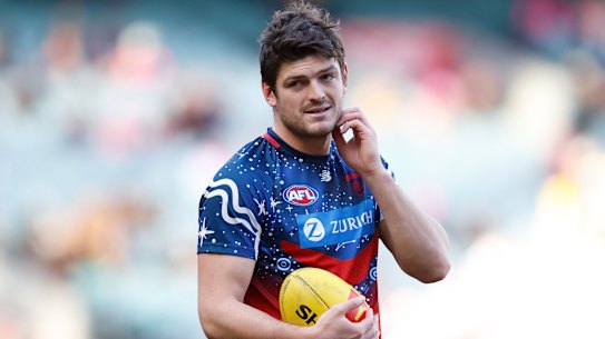 MELBOURNE, AUSTRALIA - AUGUST 20: Angus Brayshaw of the Demons warms up before the round 23 AFL match between Melbourne Demons and Hawthorn Hawks at Melbourne Cricket Ground, on August 20, 2023, in Melbourne, Australia. (Photo by Darrian Traynor/Getty Images)