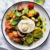 Heirloom tomatoes with burrata and basil oil