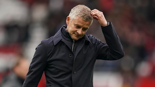 Manchester United’s manager Ole Gunnar Solskjaer walks off the pitch at the end of the English Premier League soccer match between Manchester United and Everton, at Old Trafford, Manchester, England, Saturday, Oct. 2, 2021. The match ended in a 1-1 draw. (AP Photo/Dave Thompson)