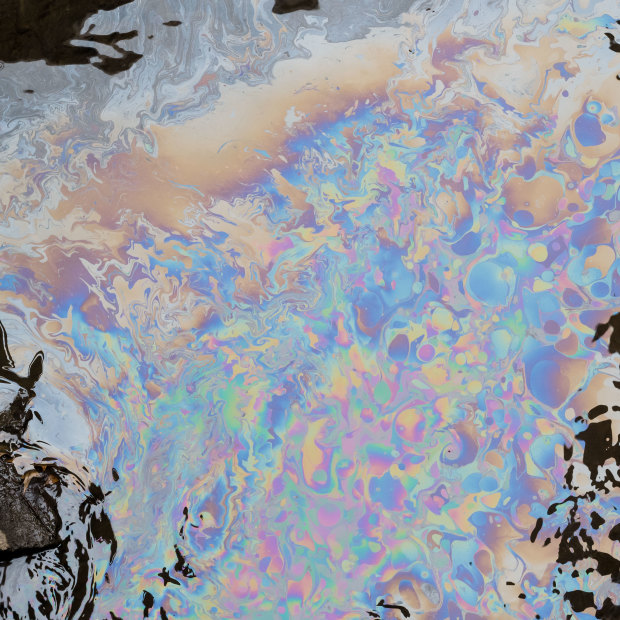 A chemical sheen on the surface of Sulphur Run downstream from the derailment site in East Palestine, Ohio.