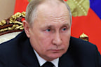 Russian President Vladimir Putin chairs a meeting with members of the government via teleconference in Moscow, Thursday, March 10, 2022. (Mikhail Klimentyev, Sputnik, Kremlin Pool Photo via AP)