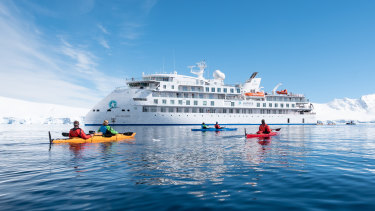 The Greg Mortimer cruise ship in Antarctic waters.