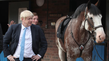 Why the long face? British Prime Minister Boris Johnson visited a police academy on Thursday.
