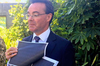 Liberal leader Michael O'Brien with the blacked-out document.