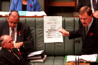 Peter Costello and John Howard debate the GST legislation in parliament.