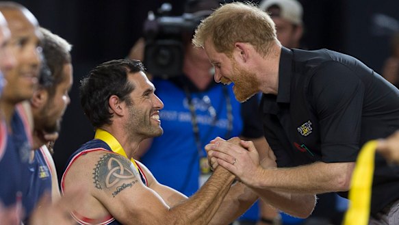 Britain's Duke of Sussex, Harry, presents a medal during the presentation following the Wheelchair Basketball Final.