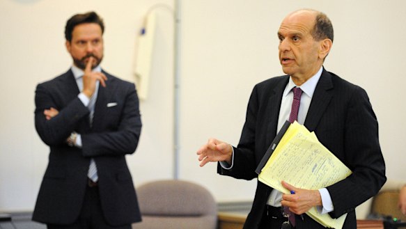 Kevin Spacey's attorney Alan Jackson, left, listens to the accuser's attorney, Mitchell Garabedian during a hearing in Nantucket District Court Monday, July 8, 2019.