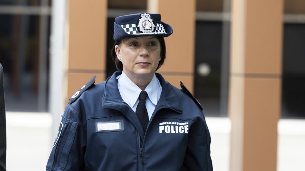 AFP acting assistant commissioner Joanne Cameron leaves the inquiry in Canberra on Thursday.