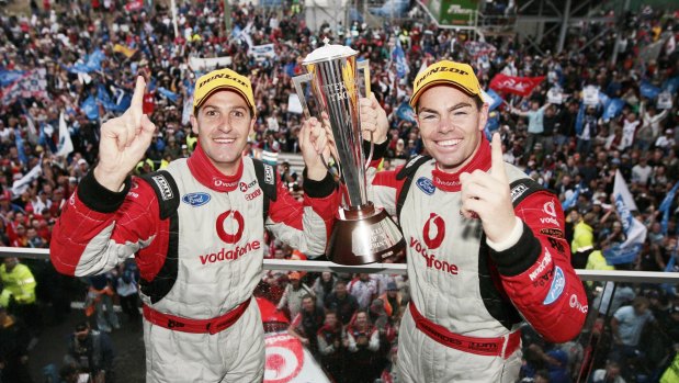 Winners are grinners: Craig Lowndes and Jamie Whincup celebrate their 2007 Bathurst win.