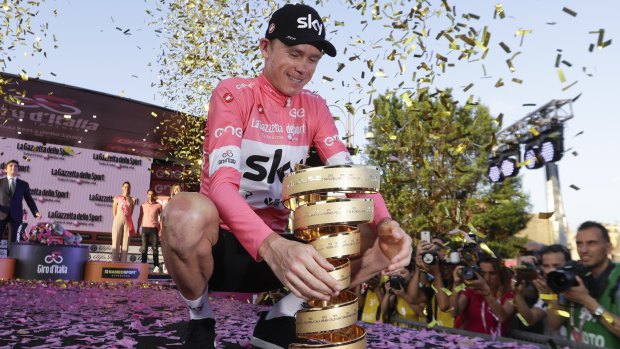Chris Froome with the Giro d'Italia trophy.