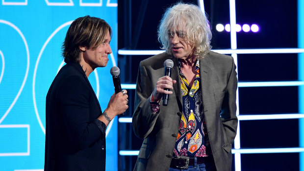 Keith Urban and Sir Bob Geldof present the ARIA Award for Album of the Year at The Star, in Sydney.