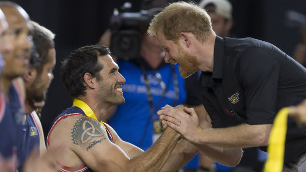 Britain's Duke of Sussex, Harry, presents a medal during the presentation following the Wheelchair Basketball Final.