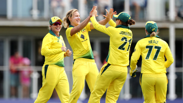 Australia's Ellyse Perry (middle) celebrates taking one of her seven wickets during the Third One Day International of the Women's Ashes.