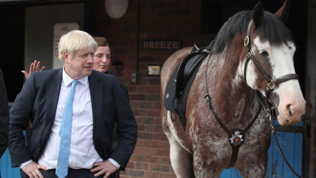 Why the long face? British Prime Minister Boris Johnson visited a police academy on Thursday.