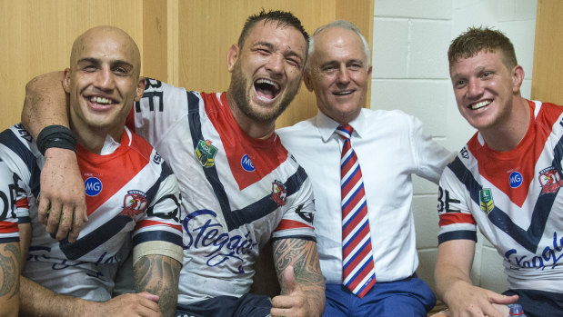 Prime form: Malcolm Turnbull poses for a photo with Blake Ferguson, Jared Waerea-Hargreaves and Dylan Napa. 