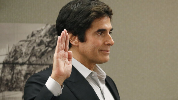 Illusionist David Copperfield is sworn in during the court case.