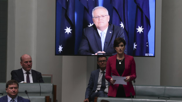 South Australian MP Nicolle Flint asks Prime Minister Scott Morrison a question during Question Time.