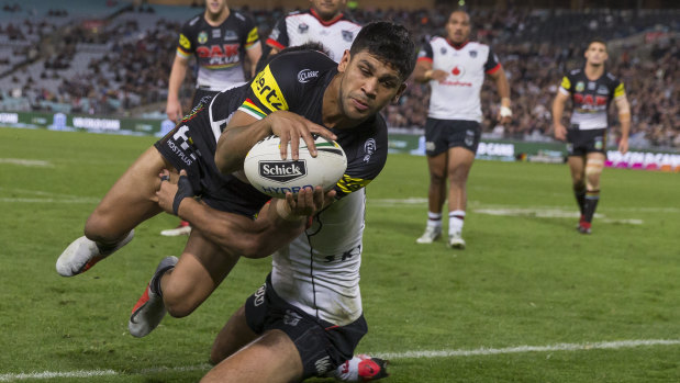 Over easy: Tyrone Peachey crosses to score for the Panthers at ANZ Stadium.