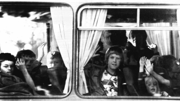 Young hostages on their way to a medical examination following their release.