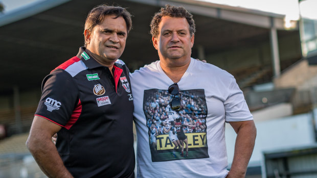 Nicky Winmar and the photographer that took the iconic photo, Wayne Ludbey, in 2018.