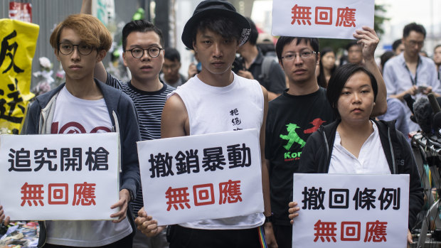 Jimmy Sham, centre, with other protest leaders in June.