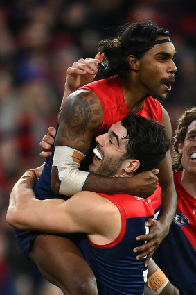 Christian Petracca, celebrating with Indigenous teammate Kozzy Pickett, condemned the latest racism incident.