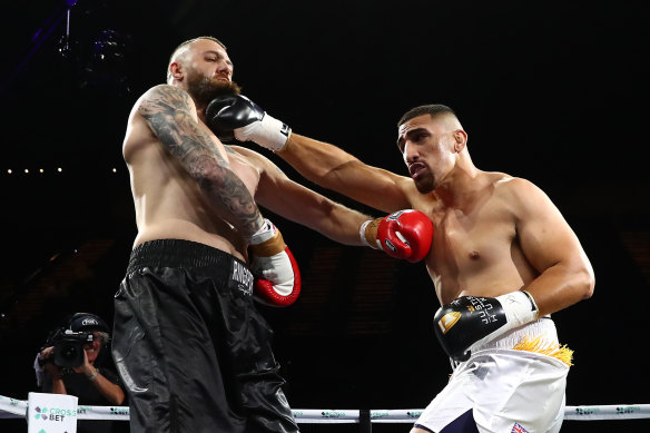 Justis Huni punches Jack Maris during Saturday night’s short-lived bout.