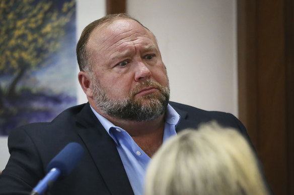 Conspiracy theorist Alex Jones attempts to answer questions about his emails asked by lawyer Mark Bankston, representing the victims of the 2012 Sandy Hook school shooting.