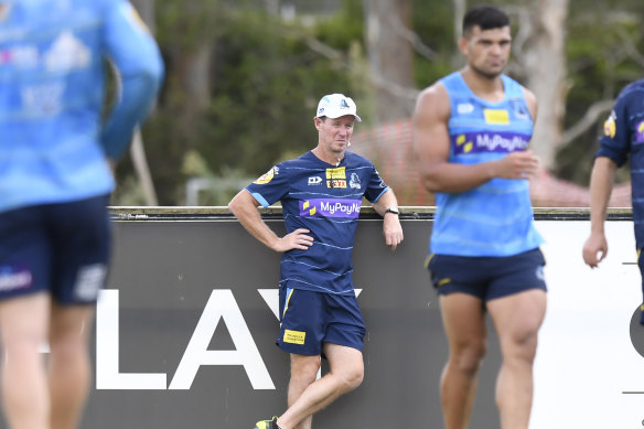 Justin Holbrook watches on as David Fifita trains with the Titans during last year’s preseason.