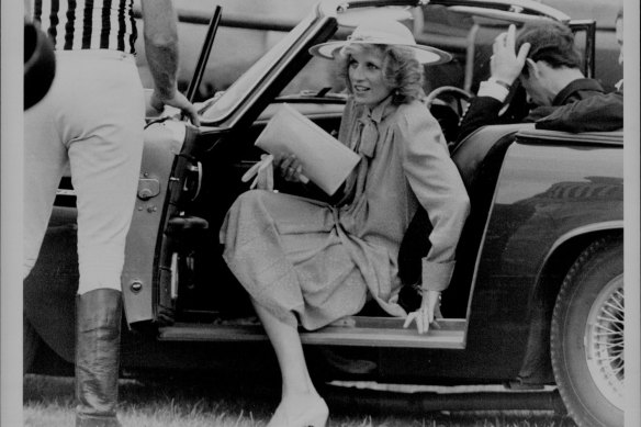 Diana arrives at a polo match at Windsor with Charles in his Aston Martin in 1984. She later drove off with a detective in her Ford Escort Cabriolet.