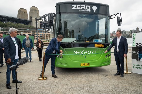 Former transport minister Andrew Constance, centre, announced several years ago an ambitious target to convert the state’s diesel bus fleet to electric vehicles within a decade.