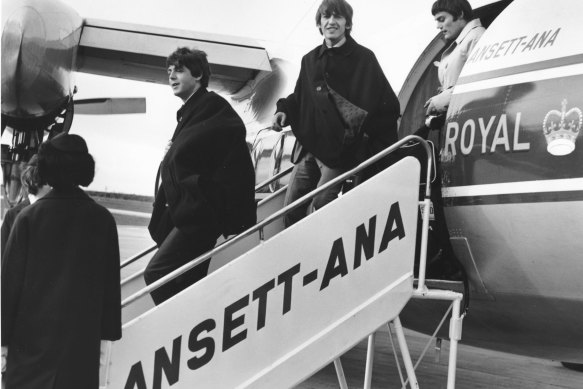 Beatles Paul McCartney, George Harrison and Jimmy Nicol arriving at Essendon Airport in June 1964