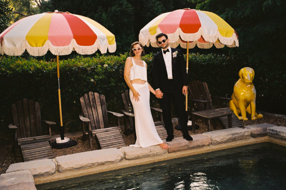 Bella Westaway and her husband take the plunge (if not in the pool).