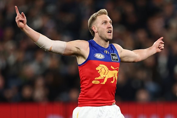 Oscar Allen of the Lions celebrates a goal.