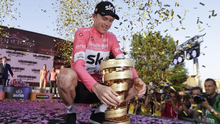 Chris Froome with the Giro d'Italia trophy.