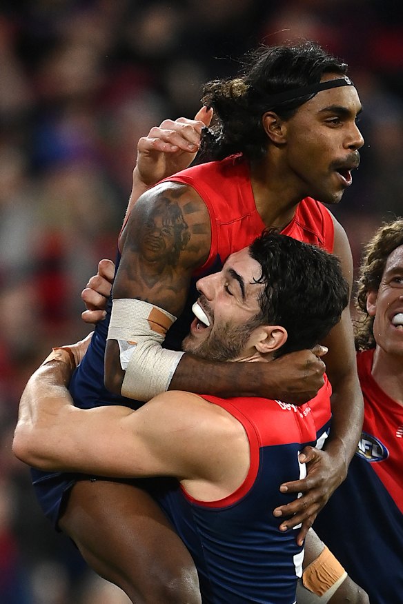 Christian Petracca, celebrating with Indigenous teammate Kozzy Pickett, condemned the latest racism incident.