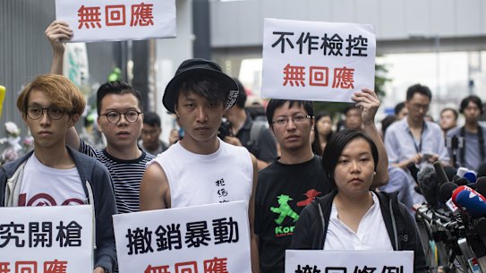 Jimmy Sham, centre, with other protest leaders in June.