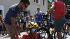 Ineos Grenadiers’ Egan Bernal reacts after a crash during stage 15. 