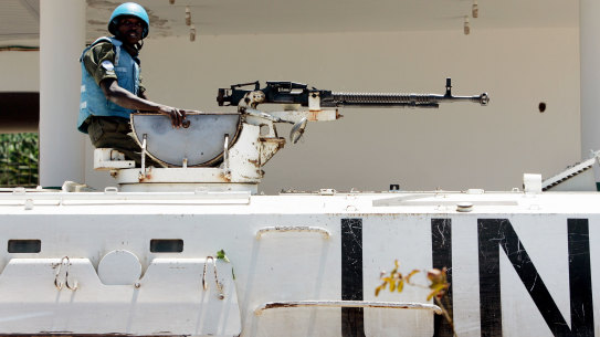 A UN peacekeeper from Ghana sits atop an armoured vehicle in Naqoura in southern Lebanon after the ceasefire in 2006.