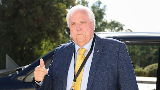 Clive Palmer, Trumpet of Patriots chairman, arrives at Parliament House on Budget day.