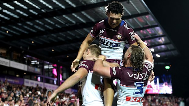 Tom Trbojevic of the Sea Eagles celebrates after scoring a try
